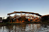 Inle Lake Myanmar. All the buildings are constructed on piles. Residents travel around by canoe, but there are also bamboo walkways and bridges over the canals, monasteries and stupas. 